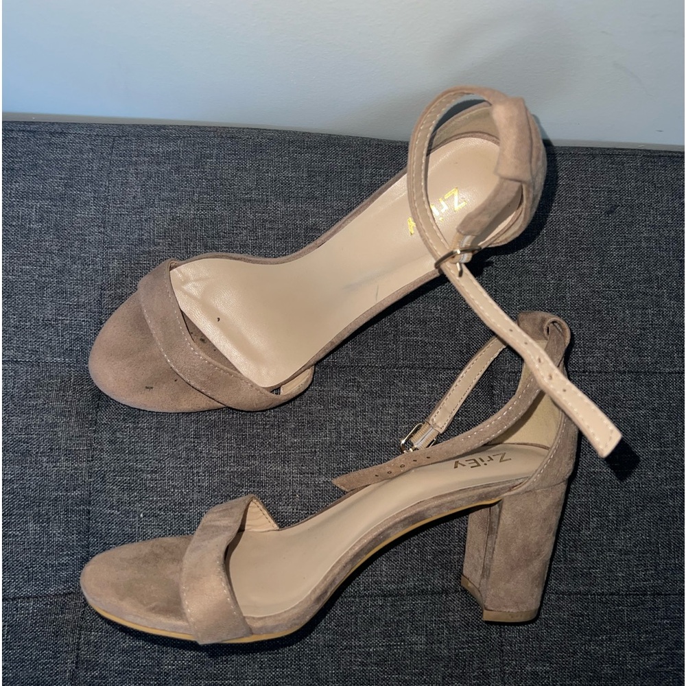 Tan suede open toe heels with ankle strap and buckle